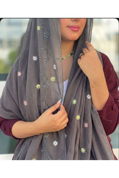 Veil Designer Two-layer gray voile veil with colorful embroidery across the e...