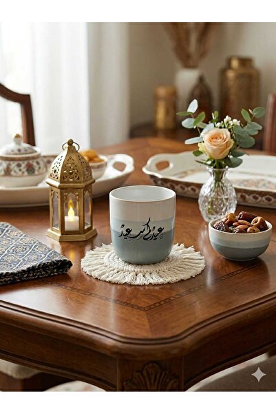 KUB A cup of coffee, a gift cup for Eid, with beautiful phrases.