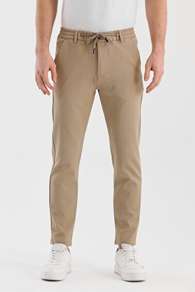 twentyfive25 بنطلون جاجر موسمي للرجال باللون البيج، قماش محبوك، خصر مطاطي، نص...