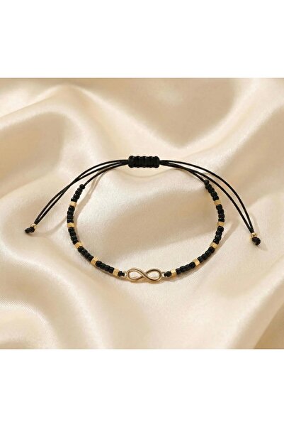 Handmade Thin adjustable Infinity Gold bracelet with black and gold beads