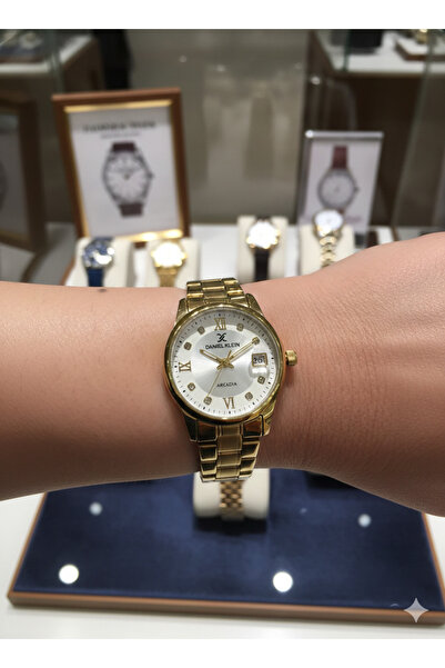 Daniel Klein Kadın Gold Renk Roma Rakamlı Taşlı Takvimli Klasik Metal Kol Saa...