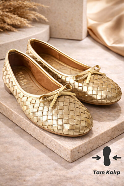 Noliva حذاء باليه نسائي من الجلد الصناعي الذهبي بنمط محبوك ومرصع بفيونكة
