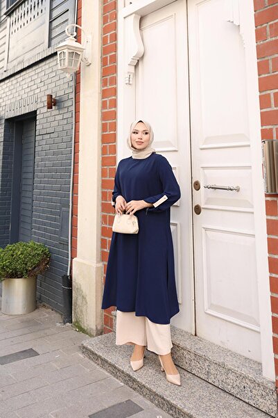 Kalemen Moda بدلة ايروبين بتفاصيل مزخرفة على الأكمام 1989 باللون الأزرق الداكن