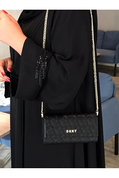 GENERAL A stylish women's Clutch Bag with a modern and elegant design.