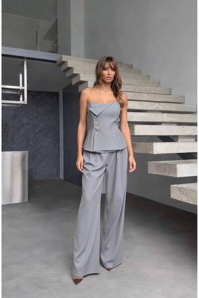 By Kuzey Aras Strapless Button Detailed Peplum Blouse and Pants Two-Piece Set