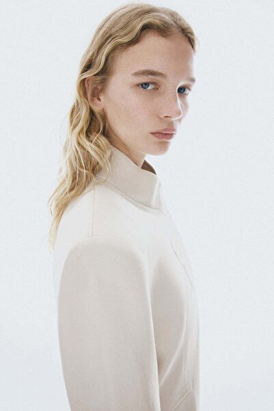 H&M بليزر لفّ بتفاصيل بروش