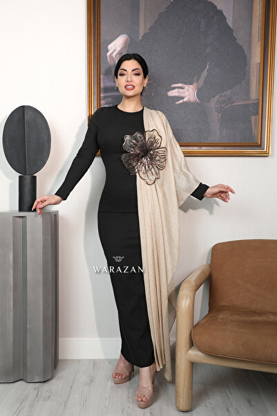 Warazan A dress With Scarf over the shoulder and a rose on the chest.