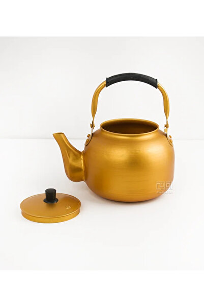 Abrias A gold (or yellow) aluminum teapot