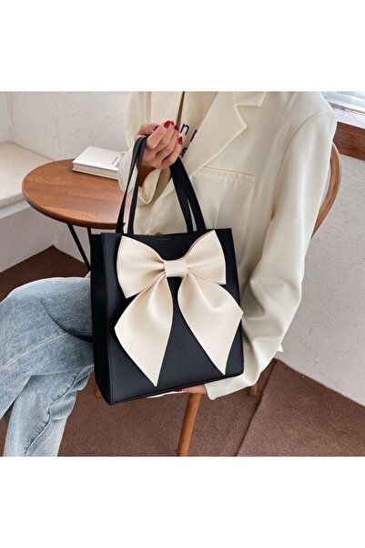 Mad Diva Geantă de mână Neagra de damă medie din piele, cu funda supradimensi...