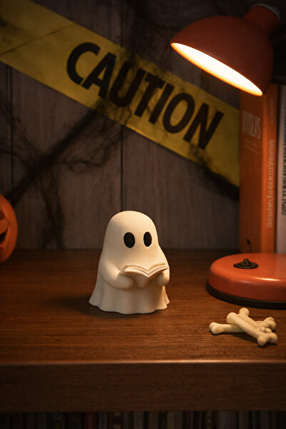 The Plasti زينة رف الكتب على شكل شبح يقرأ كتابًا كهدية