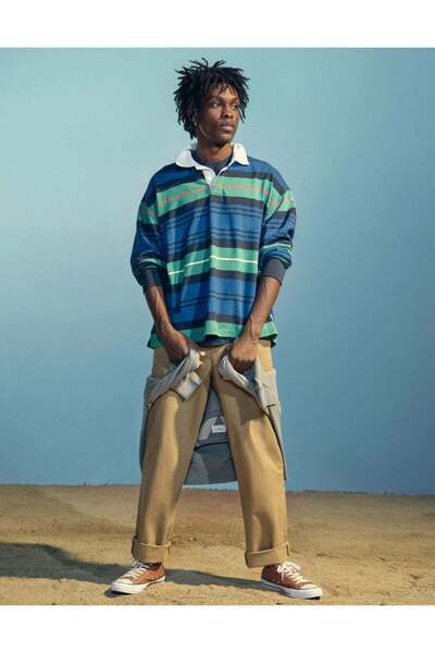 AMERICAN EAGLE بنطال AE Flex فضفاض بلون الكاكي