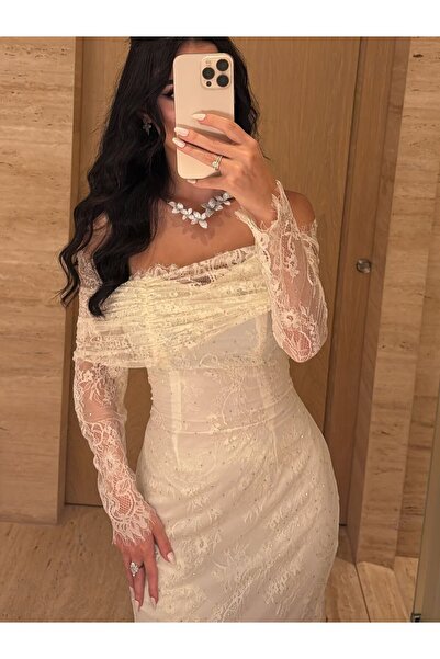 NUHAIRa A stunning dress with Lace and sequins, available in 5 sizes.