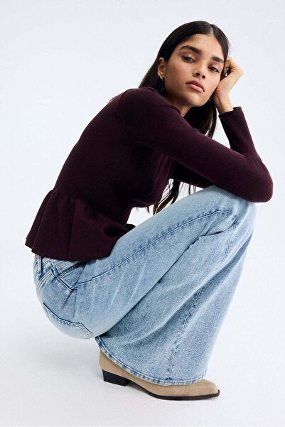 H&M بلوزة ببلوم محبوكة