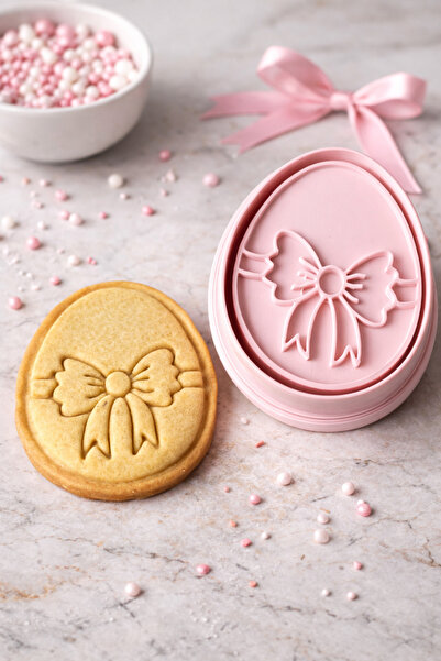 Onflow قالب كوكيز بيضاوي الشكل مع فيونكة - متوافق مع عجينة السكر والفوندان