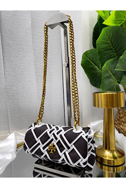 GENERAL A stylish women's Shoulder Bag with a distinctive mesh design that co...