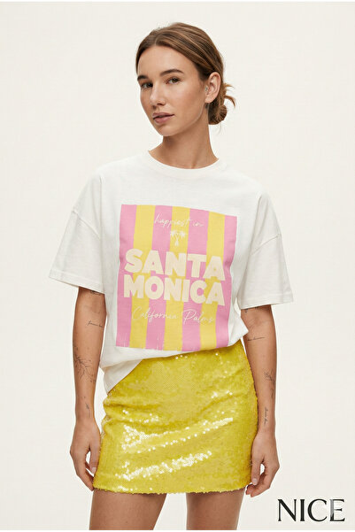NİCE تي شيرت نسائي كبير الحجم سانتا مونيكا مطبوع أبيض - ياقة دائرية، 100% قطن...