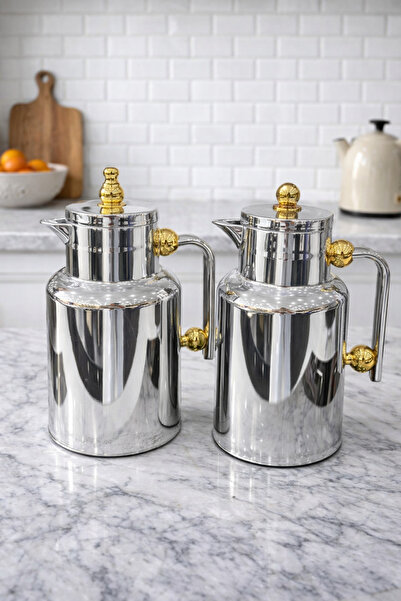 Rwafd Rema Silver-colored thermos with gold and silver accents, 600 ml