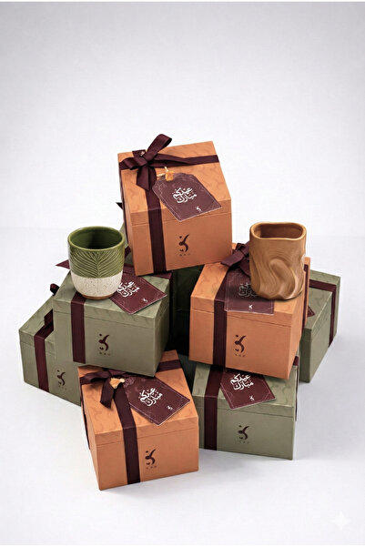 Nao Eid giveaways (5 palm tree cups) wrapped and ready for gifting with a gre...