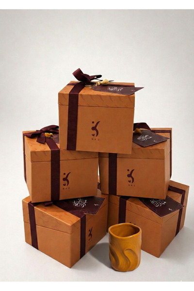 Nao Eid party favors (5 sand cups) wrapped and ready to give as a gift, with ...