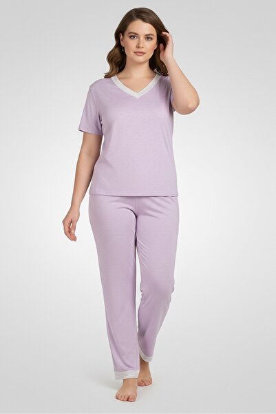 Kathy Ireland طقم بيجاما نسائي من قطعتين، بلوزة وبنطال بلون بنفسجي فاتح.