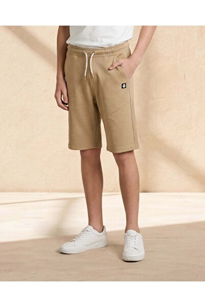 REDTAG شورت رياضي بيج اللون من قماش البيكيه قماش إنترلوك للأولاد الكبار