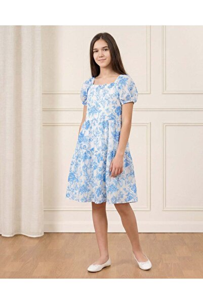 REDTAG فستان متعدد الطبقات أبيض وأزرق بنقشة زهور قماش جاكار للبنات في المرحلة...