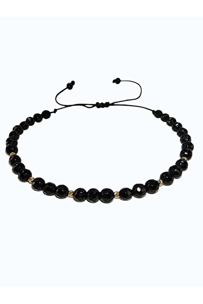 Zephyrs Bijoux Bracelet on a string with faceted onyx, 6 8K gold balls (Au 333)