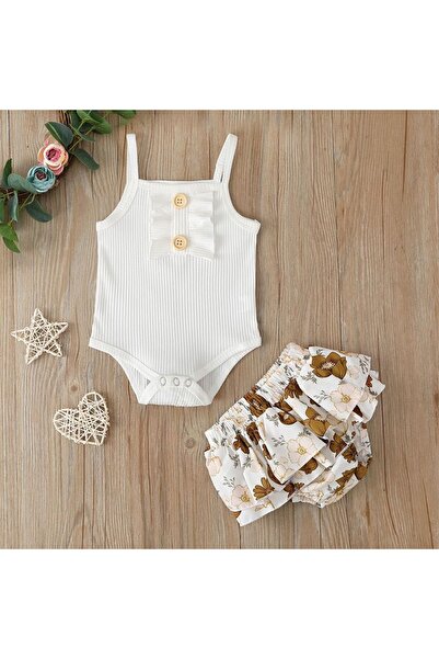 GENERAL A distinctive two-piece baby girl's set, sizes 12 to 24 months.