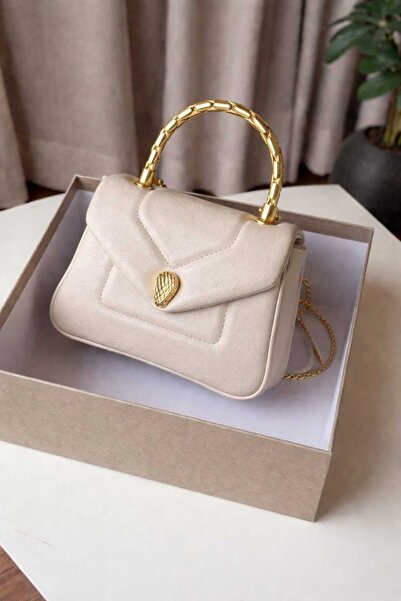 GENERAL A Clutch Bag with a luxurious design and a gold handle, excellent qua...