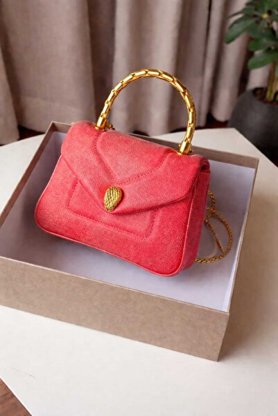 GENERAL A Clutch Bag with a luxurious design and a gold handle, excellent qua...