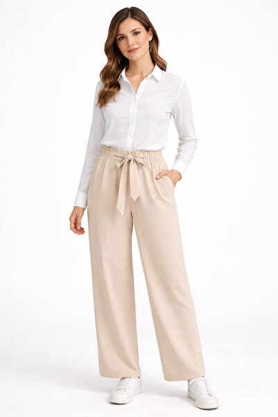 Nuevo بنطلون نسائي من القماش باللون البيج بخصر مطاطي وقصة مريحة وساق مستقيمة ...