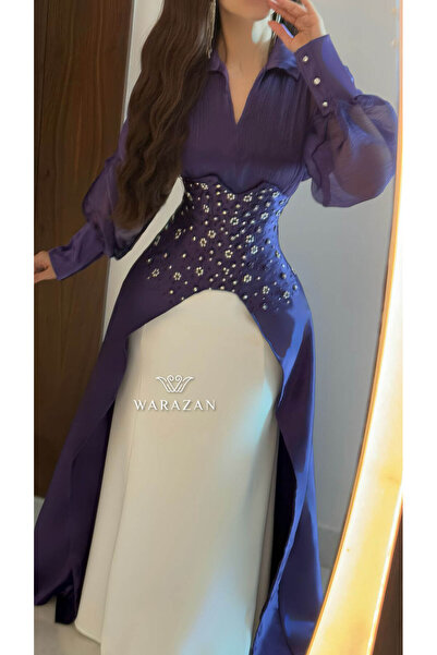 Warazan A royal dress with crystals, sheer sleeves, and an elegant style.