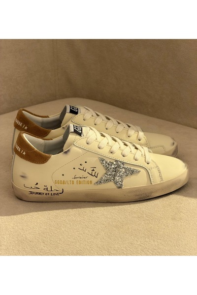 Golden غوس للنساء