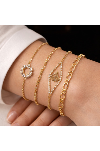 M2 group Women's gold watch set with a collection of elegant, gem-studded bra...