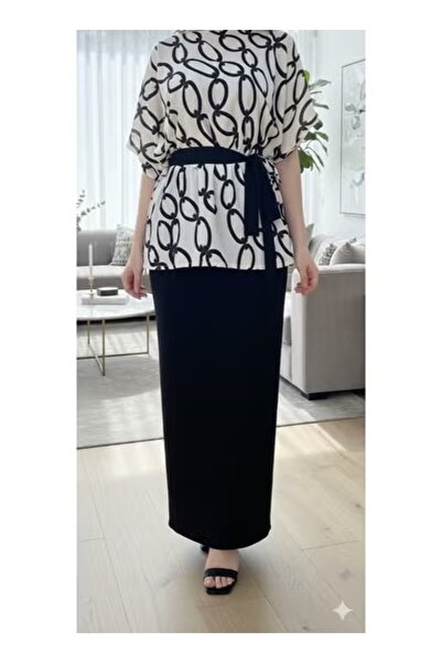 FULLJOY A long, straight-cut skirt; an elegant skirt that adds beauty and sop...