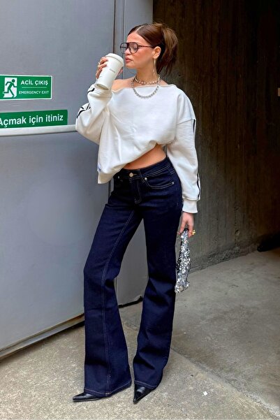 bases. Μποτάκι με χαμηλή μέση τζιν