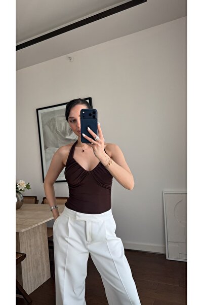 sinemkivanc co BOYUNDAN GEÇMELİ BÜZGÜLÜ BODYSUİT