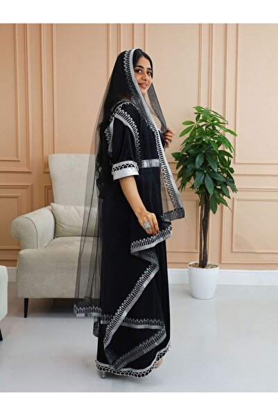 BS A traditional jalabiya with a design inspired by authentic Arab identity, ...