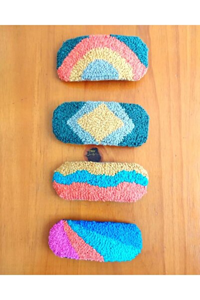 Nova Set ručno izrađenih kopči sa izvezenim perforacijama