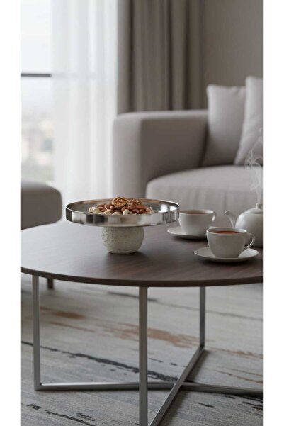 Generic A set of dessert and fruit serving dishes with a luxurious decorative...