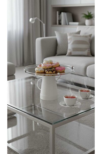 Generic A set of dessert and fruit serving dishes with a luxurious decorative...