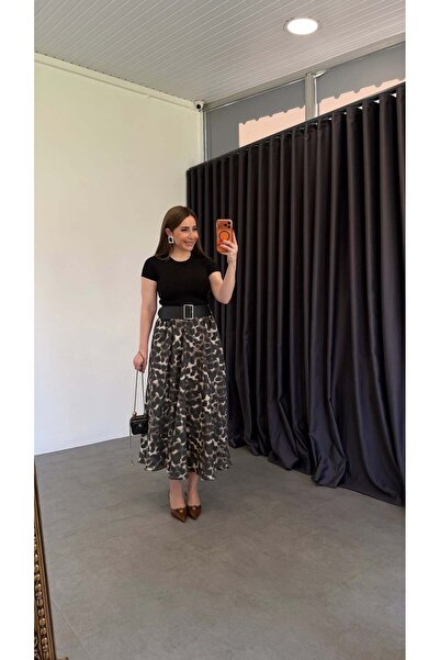 elif teke تنورة سميكة بنمط ليو مكونة من حزام قطع باللون الأسود