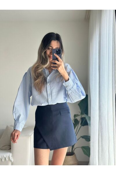 MODA تنورة قصيرة بقصة غير متماثلة باللون الأزرق الداكن