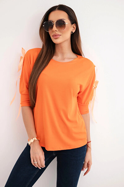 Kesi Women's orange blouse with ribbing and decorative ties on the sleeves