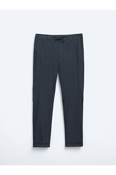 Kip Tamnoplave jednobojne tkane ležerne pantalone od pamučne mješavine za trč...