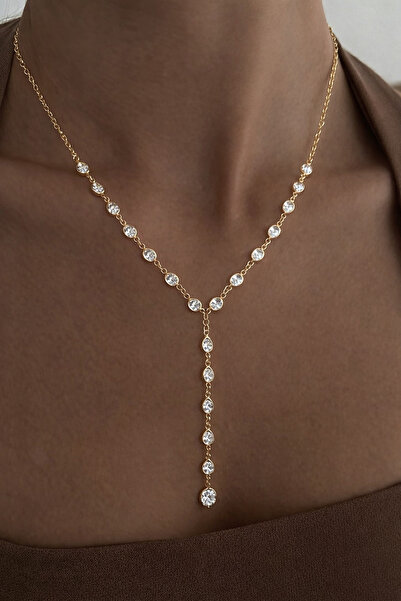 Vitastyle قلادة على شكل حرف Y من الفولاذ باللون الذهبي مع تفاصيل حجر أبيض مستدير