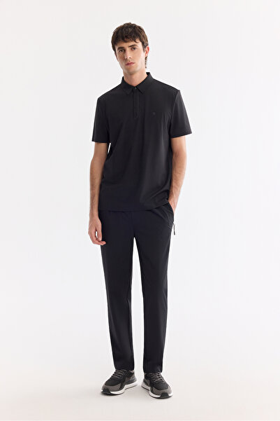 Avva بنطلون رجالي أسود مقاوم للماء من القماش التقني بتفاصيل سحاب وحزام خصر مر...