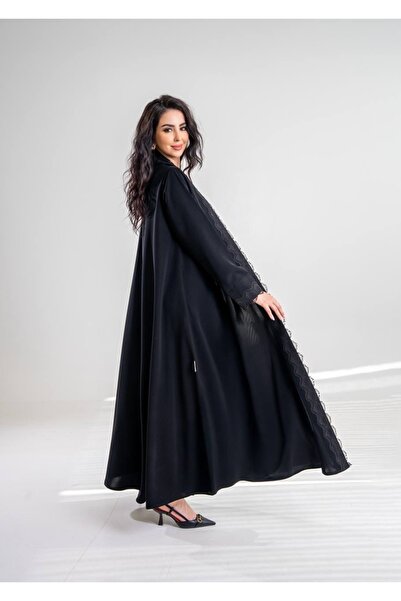 Al Afnan Boutique An elegant and attractive abaya made of deep black cobra Cr...