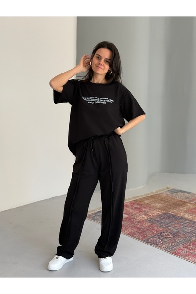 Baycombine35 قص بالليزر تي شيرت - تفاصيل درزات بدلة رياضية نسائية مكونة من قط...