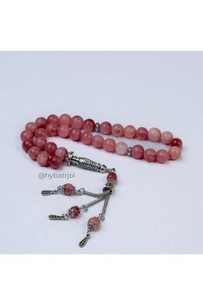Yasamtohumu A luxurious and high-quality pink agate rosary with white accents.